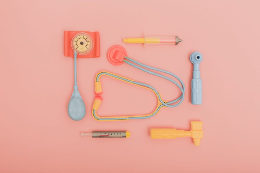medical toys on a pink background
